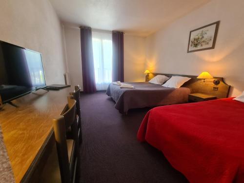 Foto de una habitación de Hôtel Le Montaigu