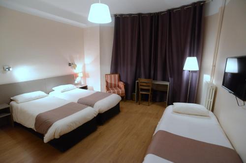 Foto de una habitación de Hôtel Mondial
