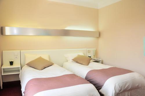 Foto de una habitación de Hôtel Mondial