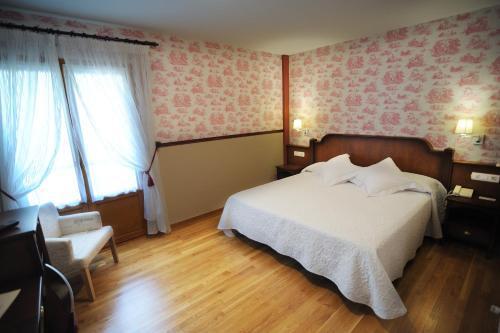 Foto de una habitación de Hotel Abetos