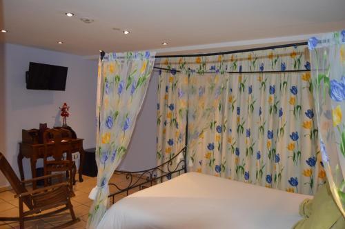 Foto de una habitación de Hotel Parador de Canolich