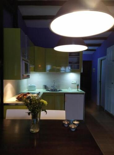 Foto de una habitación de Apartamentos La Iguana