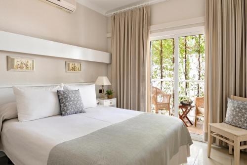 Foto de una habitación de Hotel La Goleta