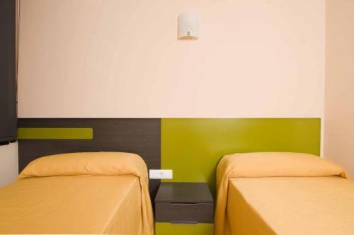 Foto de una habitación de Hotel Llagotel