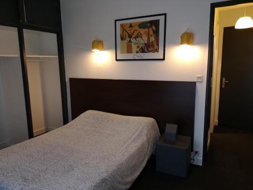 Foto de una habitación de Acqs Hôtel