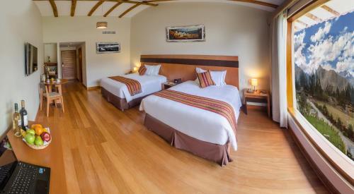Foto de una habitación de Hotel Taypikala Deluxe Valle Sagrado