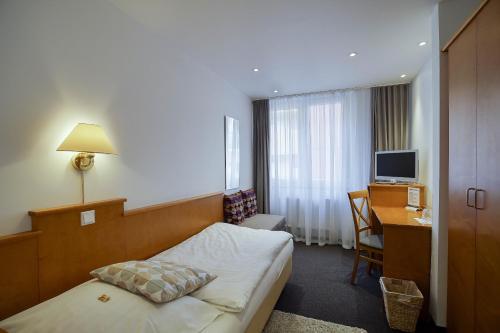Foto de una habitación de Hotel Maxim