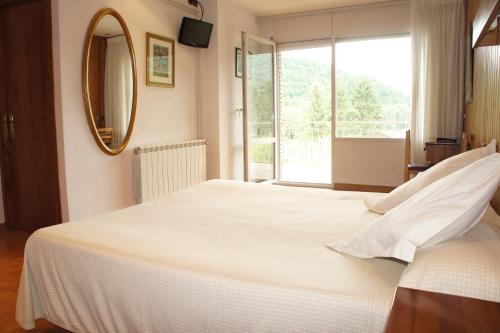 Foto de una habitación de Hotel Solana del Ter