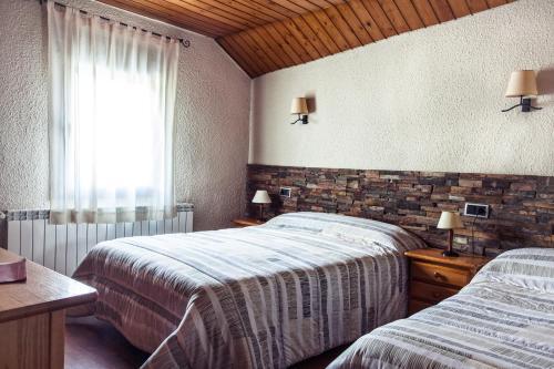 Foto de una habitación de Hostal La Plaça