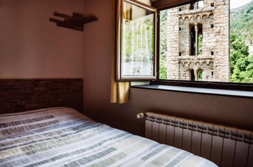 Foto de una habitación de Hostal La Plaça