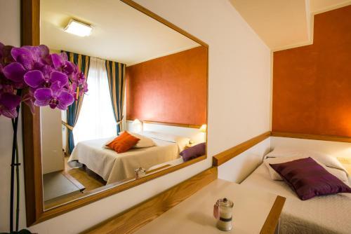 Foto de una habitación de Hotel Roma
