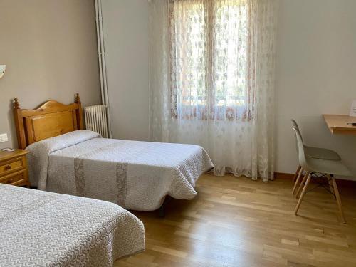 Foto de una habitación de Hostal L&amp;#039;Estació