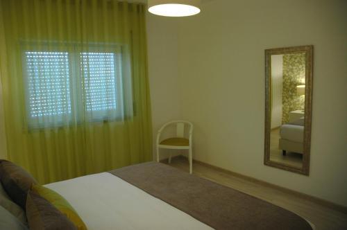 Foto de una habitación de Hotel Dom Lourenco