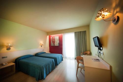 Foto de una habitación de Hotel Tramuntana