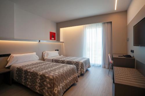 Foto de una habitación de Hotel Tramuntana