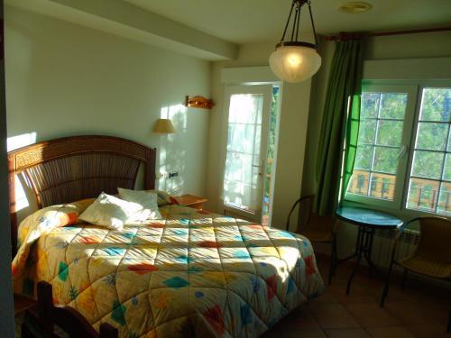 Foto de una habitación de Apartamentos Turísticos Cumbres Verdes