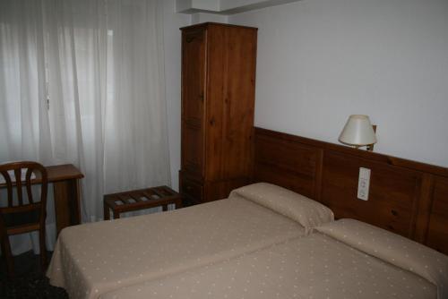 Foto de una habitación de Hostal Puente de Piedra