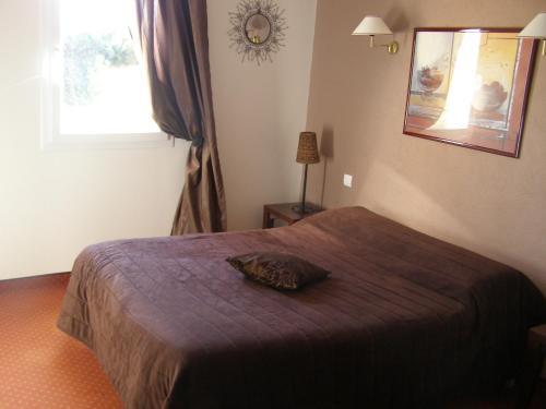 Foto de una habitación de Hotel Le Mas De Gaujac
