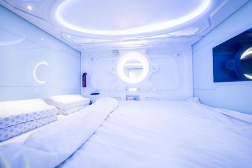 Foto de una habitación de Albergue Optimi Rooms