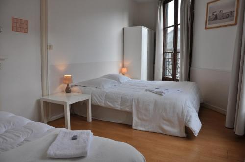 Foto de una habitación de Cafe Hotel du Theatre