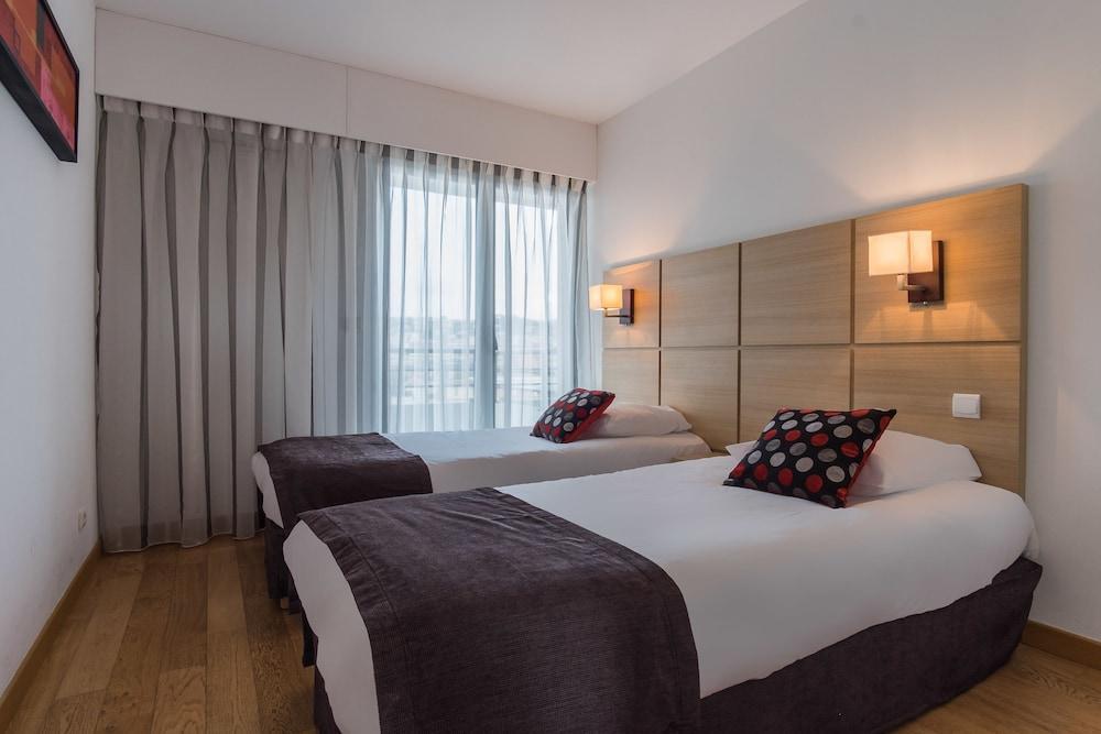 Foto de una habitación de Résidence Néméa Le Lido