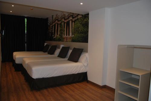 Foto de una habitación de Hotel BESTPRICE Gracia
