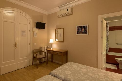 Foto de una habitación de Hostal Santillan