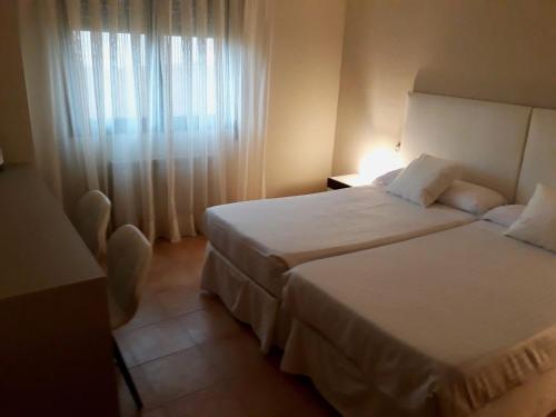 Foto de una habitación de Hostal Casa Aurita Adults Only