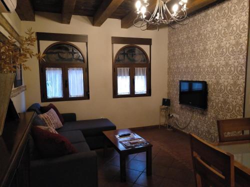 Foto de una habitación de Apartamentos La Casa Del Grial
