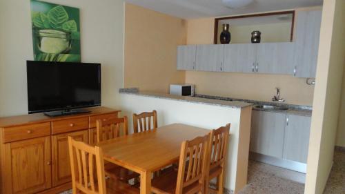 Foto de una habitación de Apartamentos Cala Llonga