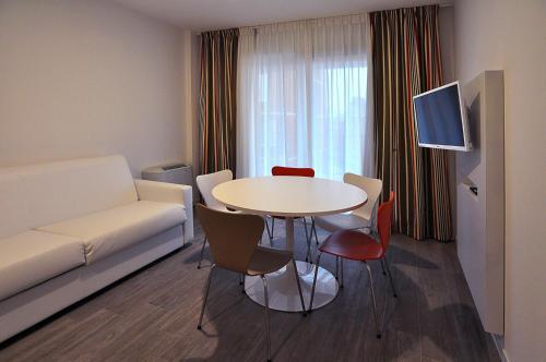 Foto de una habitación de BB Hotels Aparthotel Arcimboldi