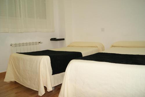 Foto de una habitación de Habitaciones El Escorial