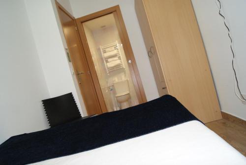 Foto de una habitación de Habitaciones El Escorial