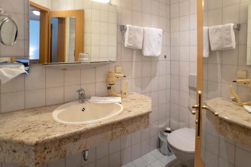 Foto de una habitación de Stadthotel Pfeffermühle