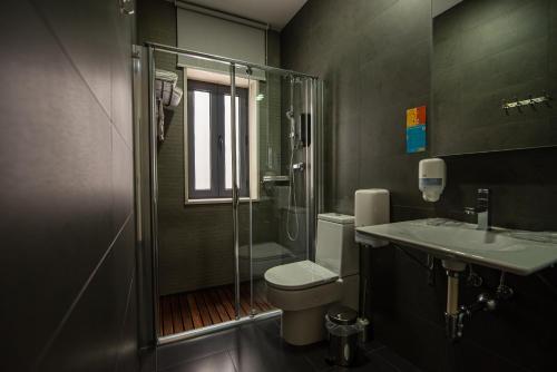 Foto de una habitación de Hotel Los Nardos
