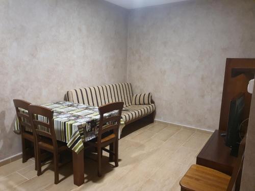 Foto de una habitación de Apartahotel La Corrala