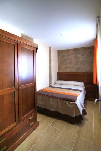 Foto de una habitación de Apartahotel La Corrala