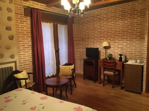 Foto de una habitación de Hotel El Barondillo