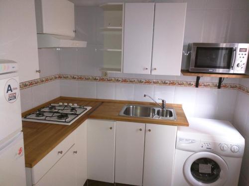 Foto de una habitación de Apartamentos San Roque 18