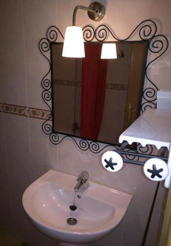 Foto de una habitación de Apartamentos San Roque 18