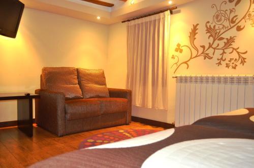 Foto de una habitación de Hotel El Molino de Floren