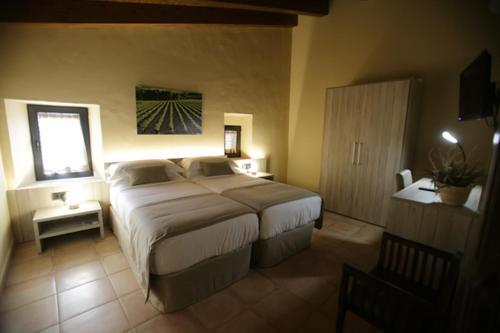 Foto de una habitación de Hotel Can Panyella