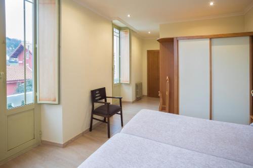 Foto de una habitación de Hotel Roma