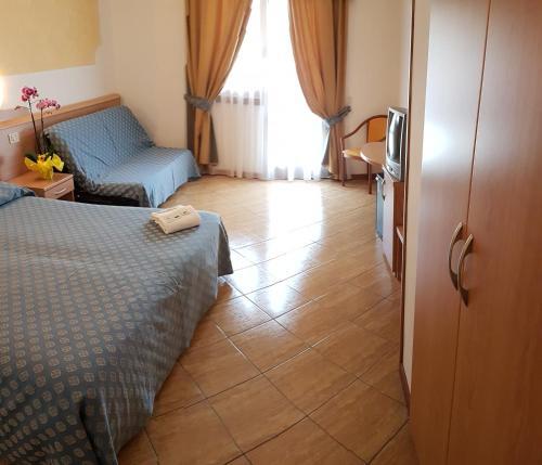 Foto de una habitación de Hotel Piccolo Paradiso
