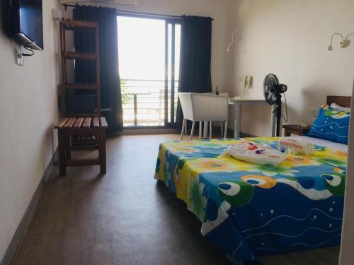 Foto de una habitación de Hôtel Ambatoloaka