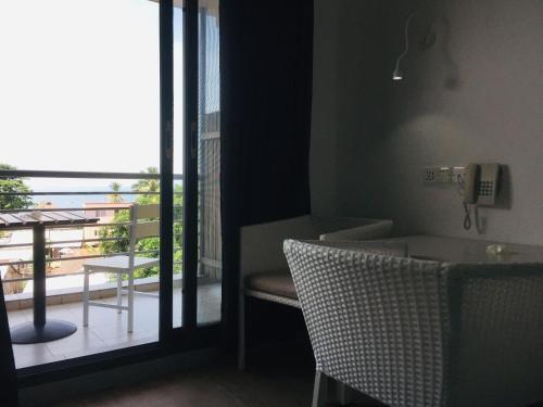 Foto de una habitación de Hôtel Ambatoloaka