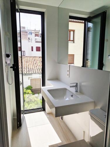 Foto de una habitación de Broz Hostel
