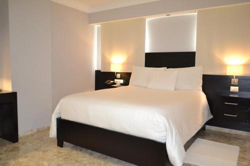 Foto de una habitación de Hotel Plaza Florida Suites