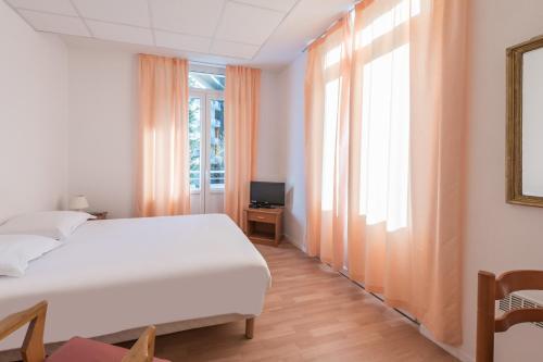 Foto de una habitación de City Résidence Termalia