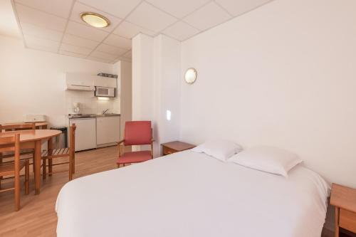 Foto de una habitación de City Résidence Termalia